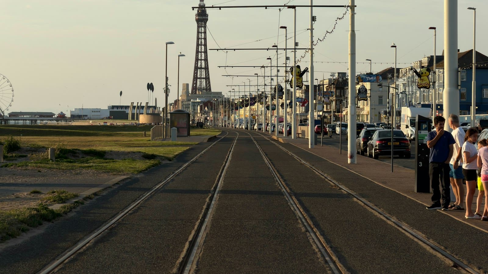 Tram tracks along Blackpool promenade with the Tower in the distance