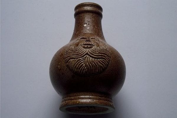 A stoneware witch bottle